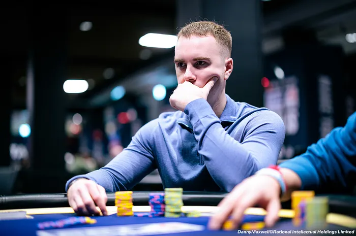 Poker player thinking about strategy at the table